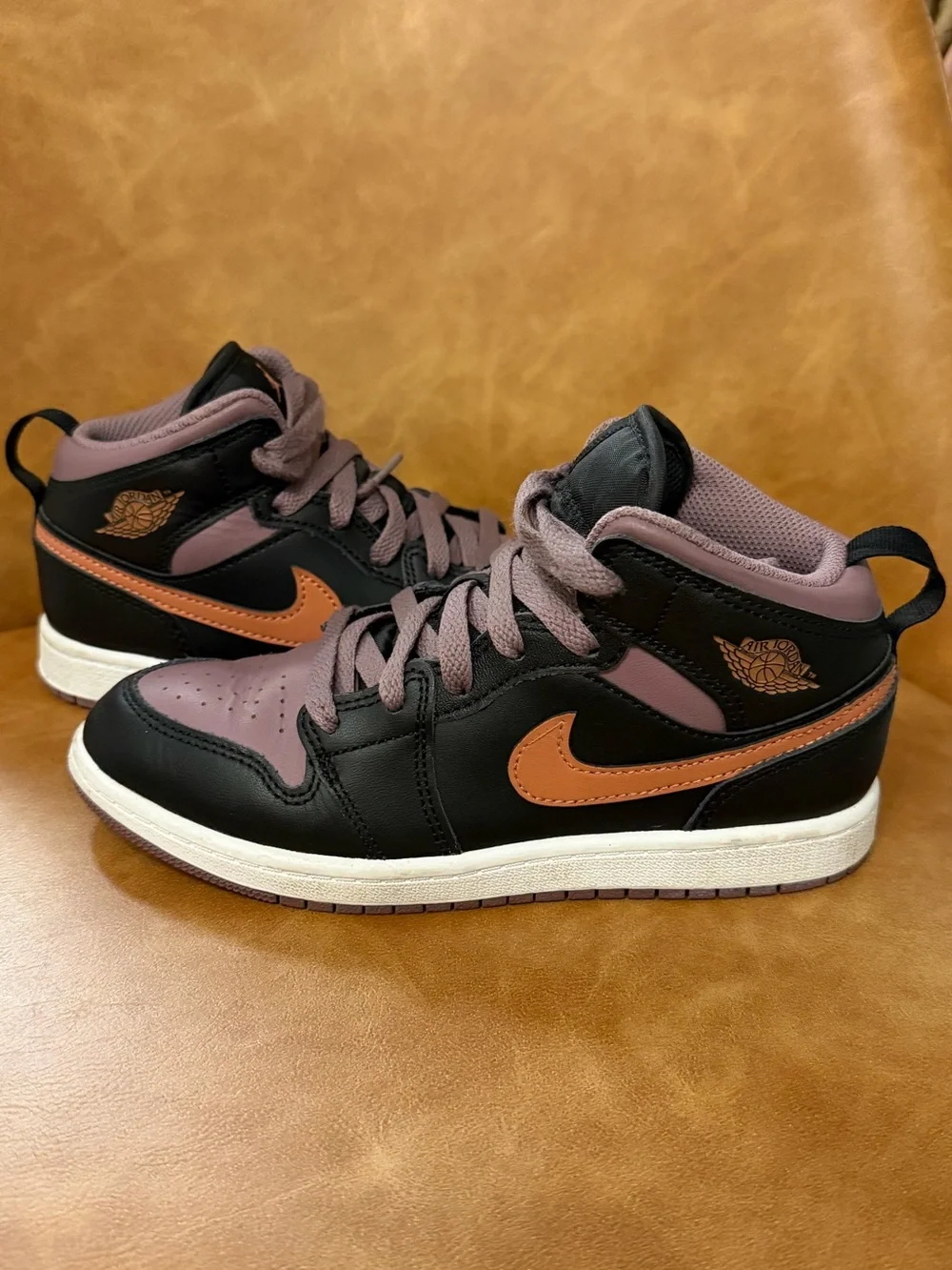 Jordan Nike Kids' Mid-Top Sneakers in Black, Mauve, and Orange. Size 3Y